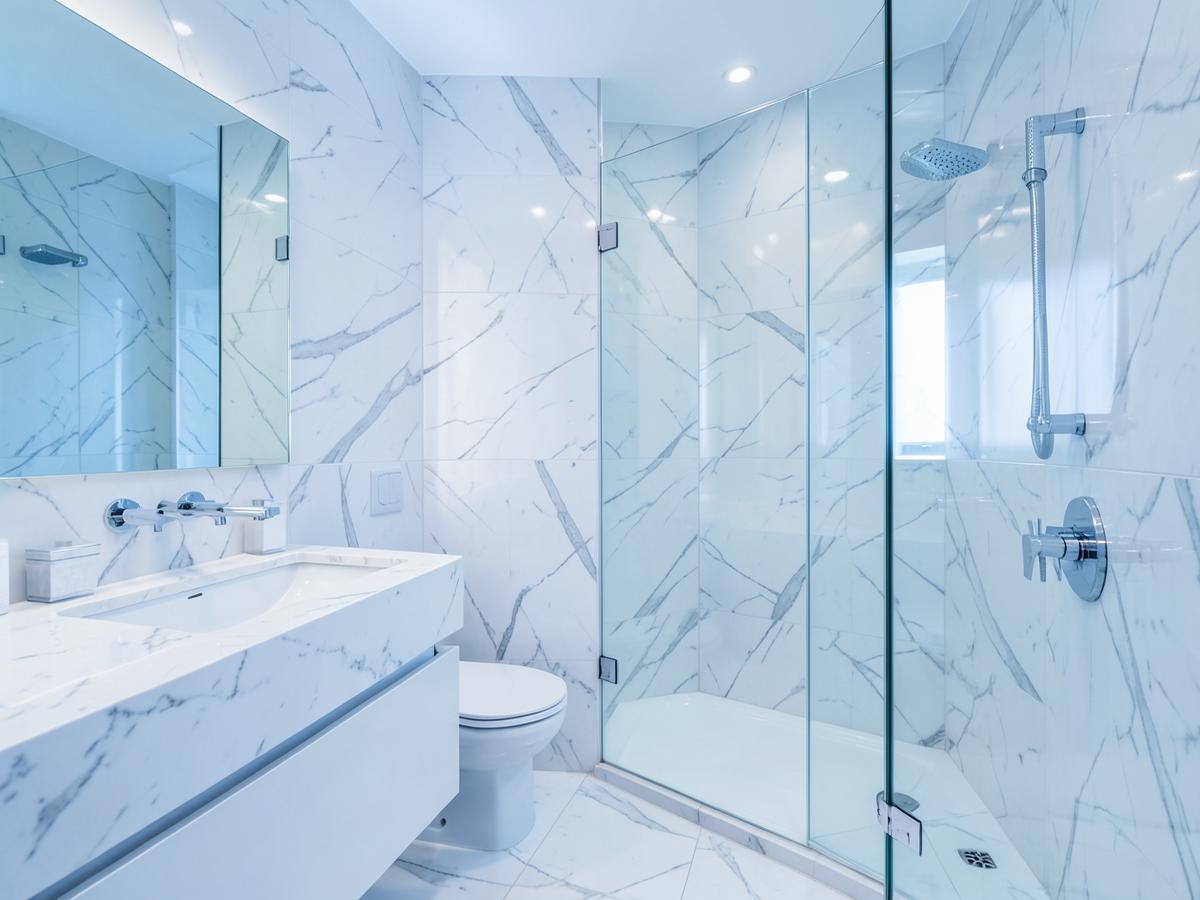 Gleaming marble bathroom after a Klean Chores Co deep clean